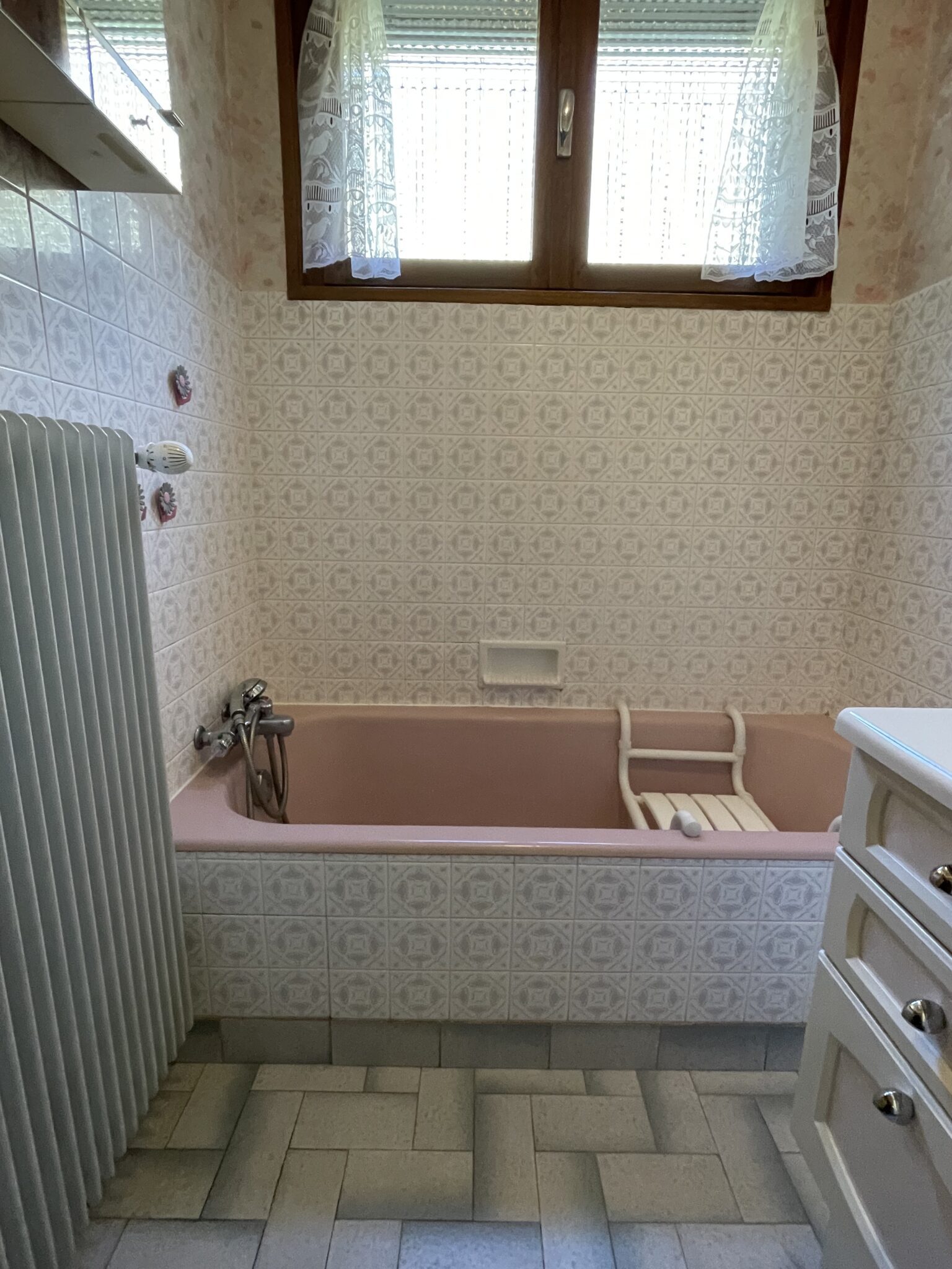 ouverture d'une baignoire et la pose d'un portillon étanche